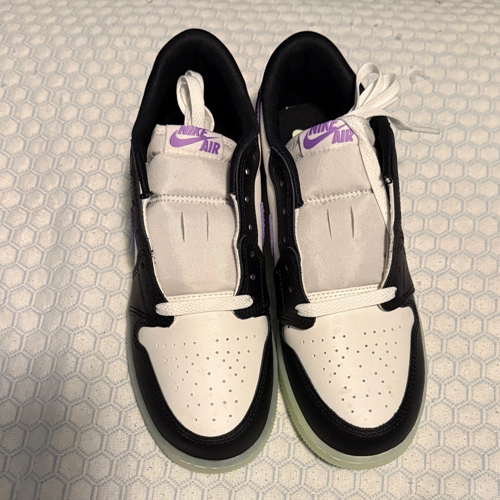 Air Jordan 1 Retro Low OG Black Raspberry sneakers with glow in the dark outsole